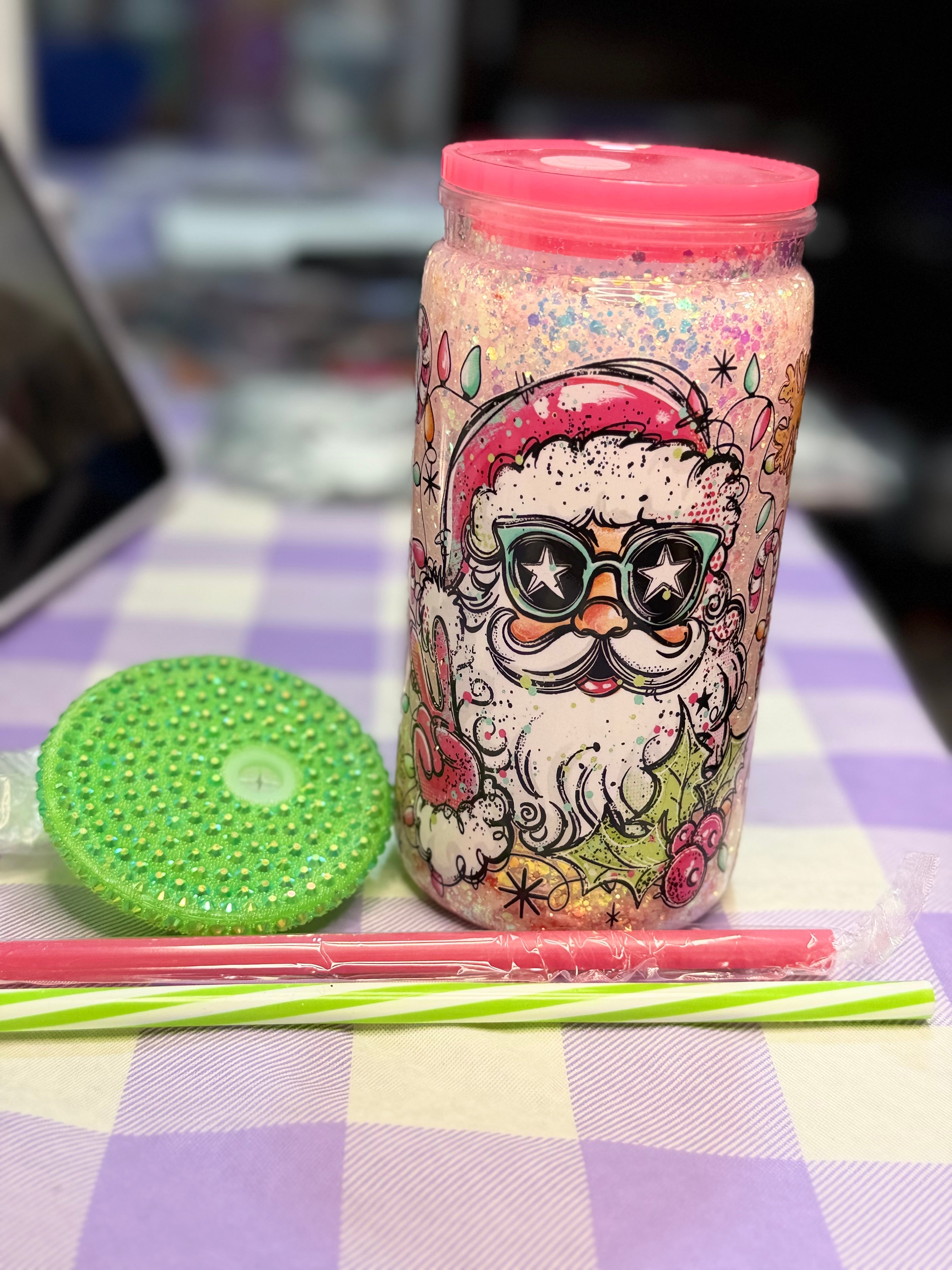 16 oz Santa with Santa straw topper, pink stripe straw and green rhinestone lid