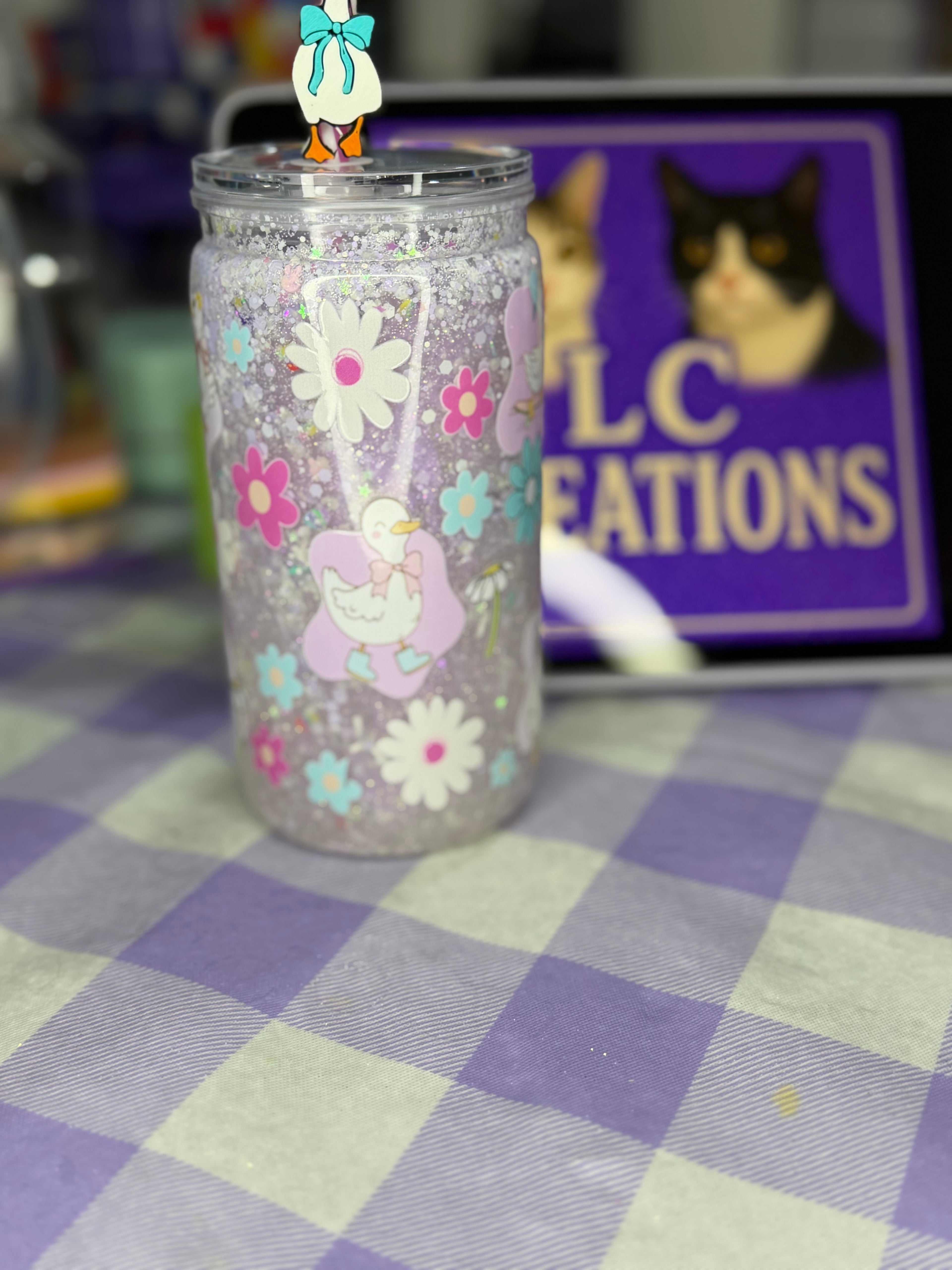 16 oz Geese drip snow globe cup with striped straw and Goose straw topper