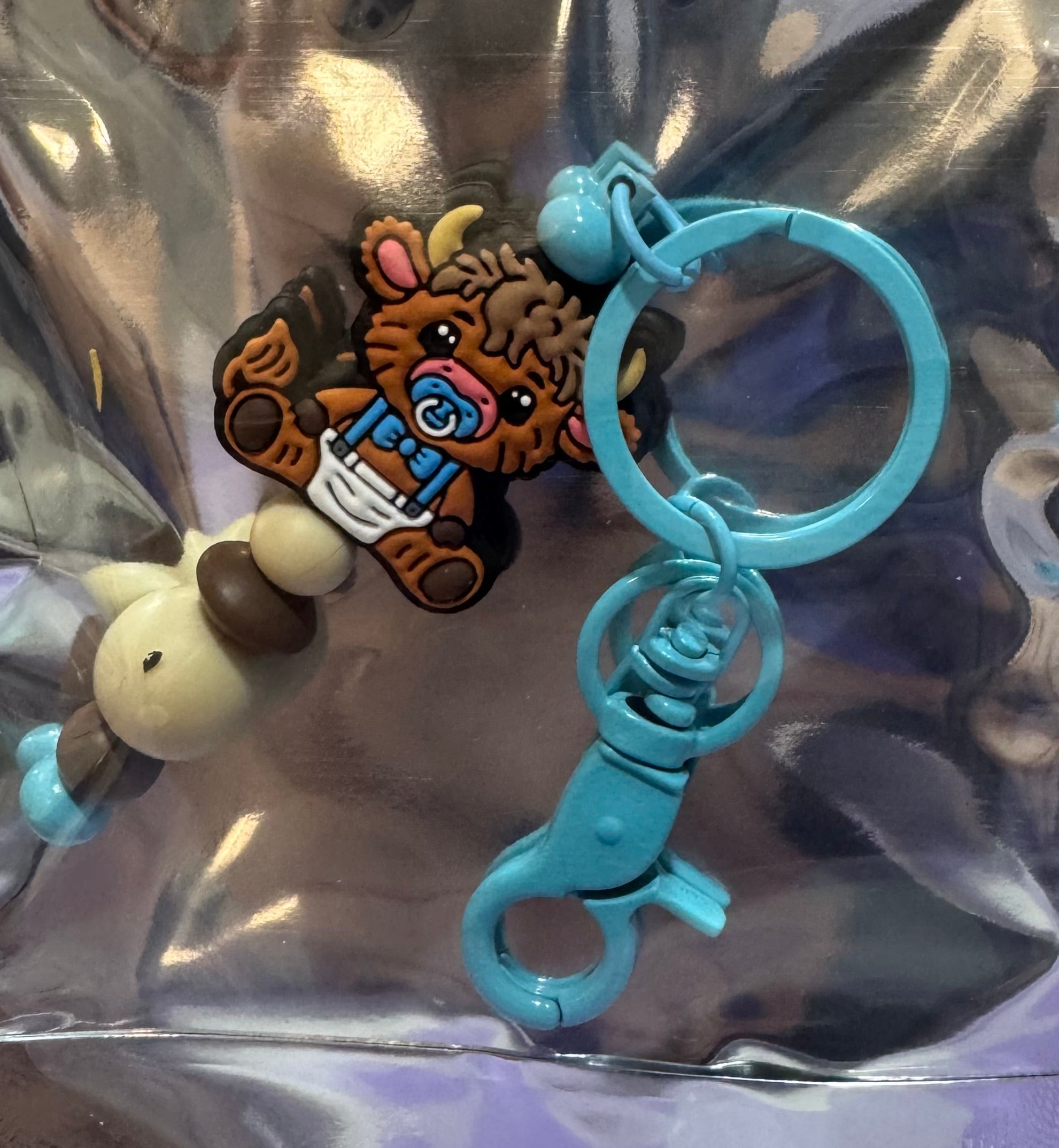 Baby highland cow beaded keychain