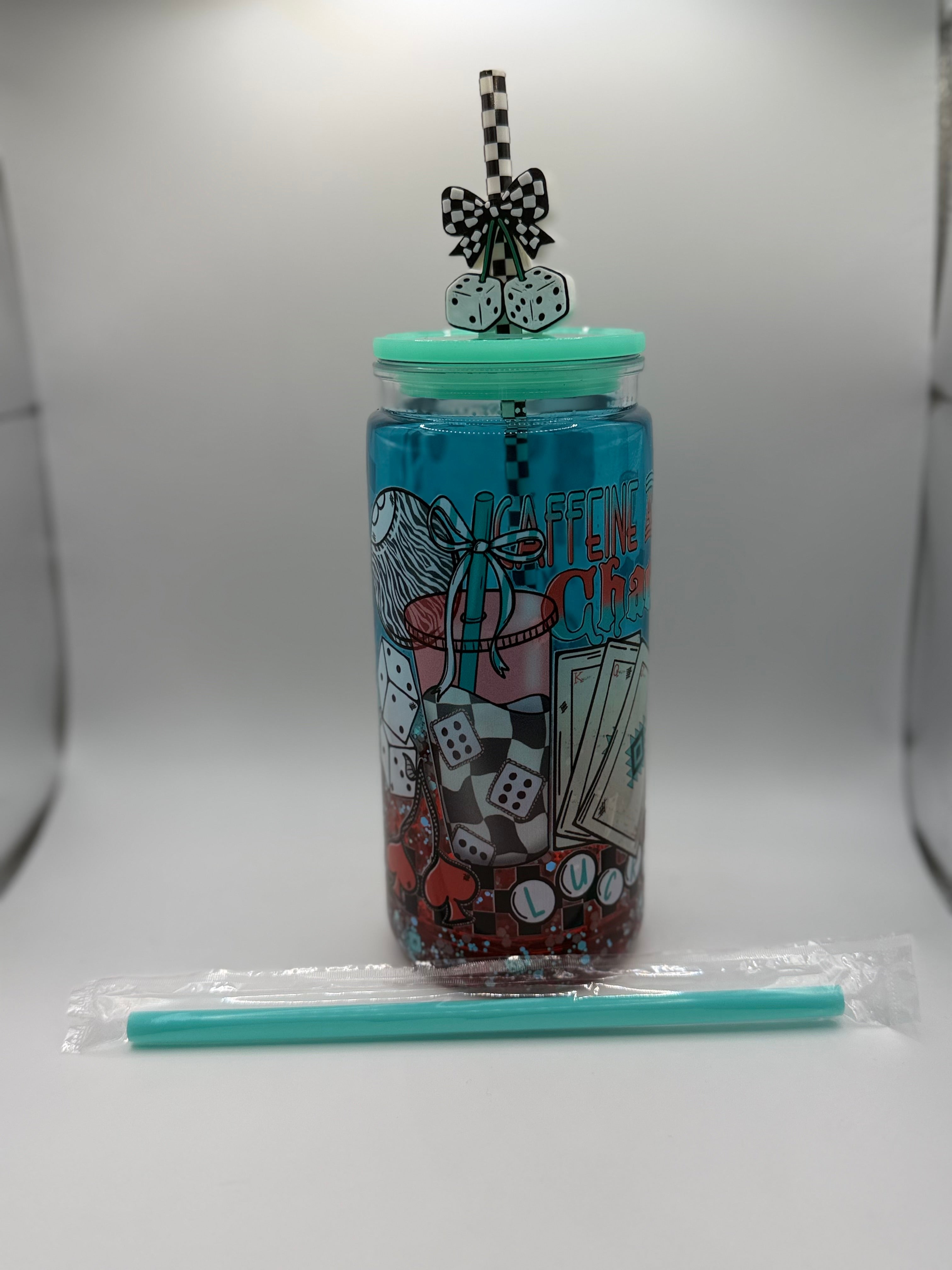 20 oz Caffeine and Chaos snow globe cup with Dice straw topper and checkered straw
