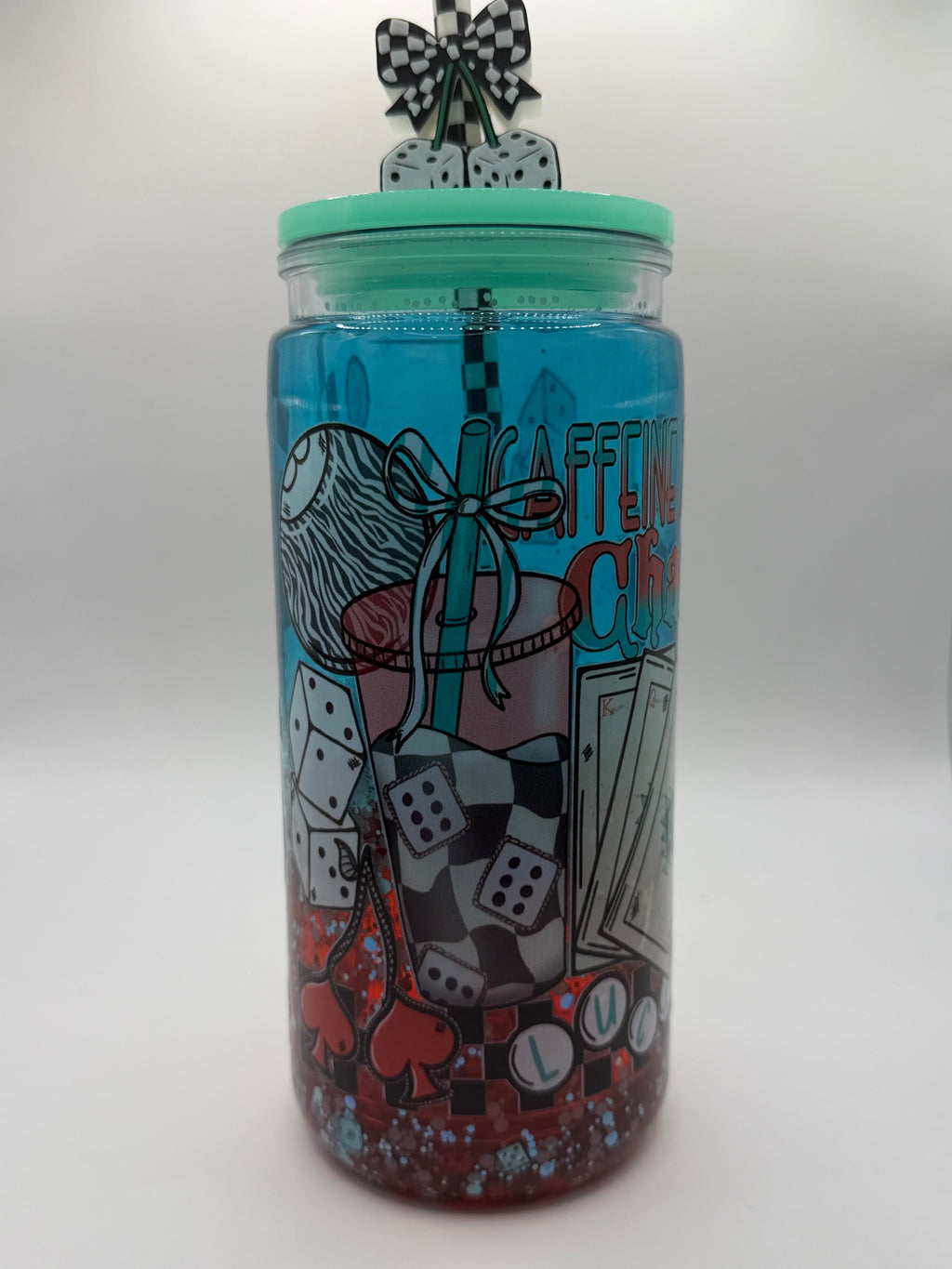 20 oz Caffeine and Chaos snow globe cup with Dice straw topper and checkered straw