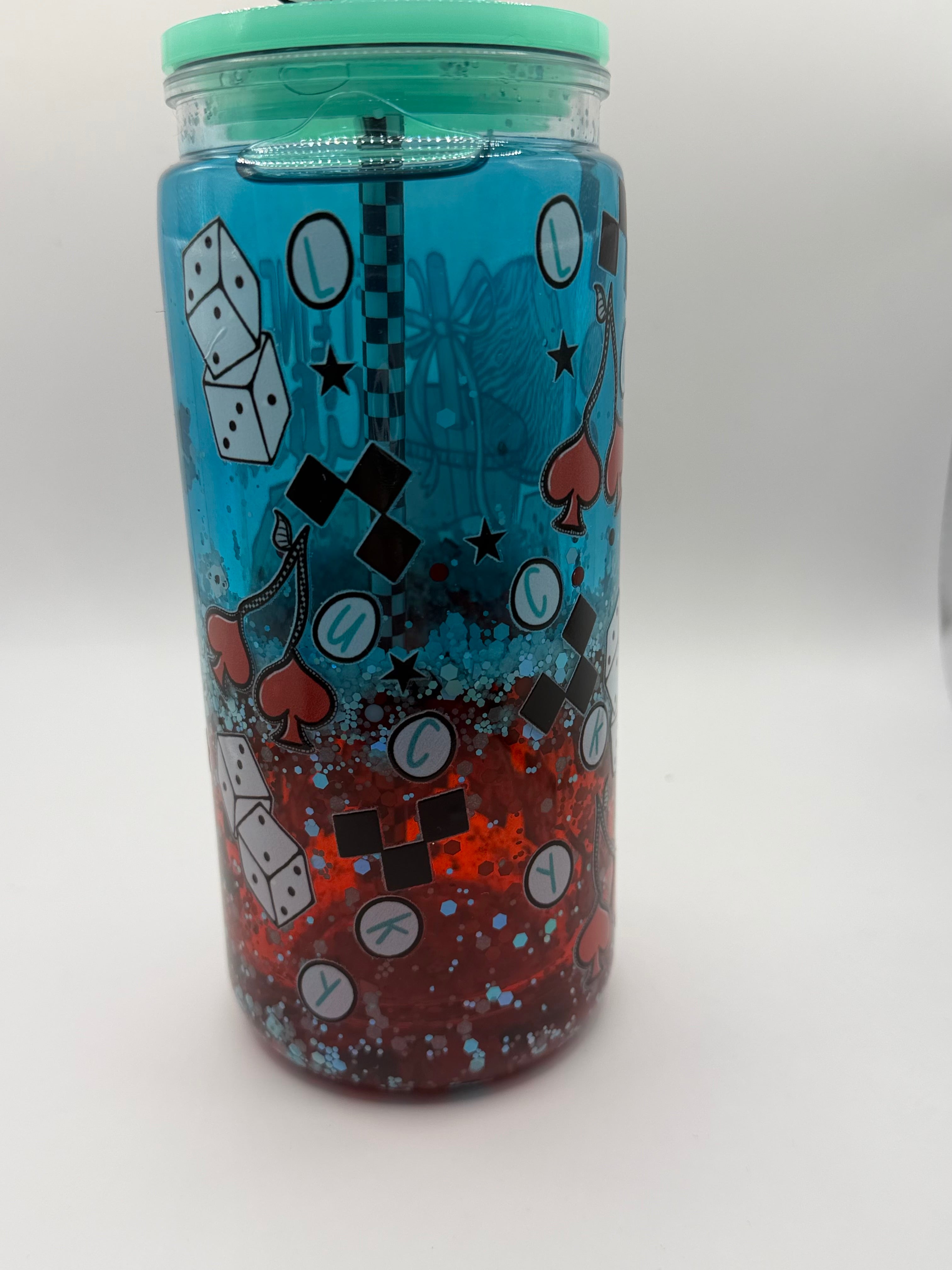20 oz Caffeine and Chaos snow globe cup with Dice straw topper and checkered straw