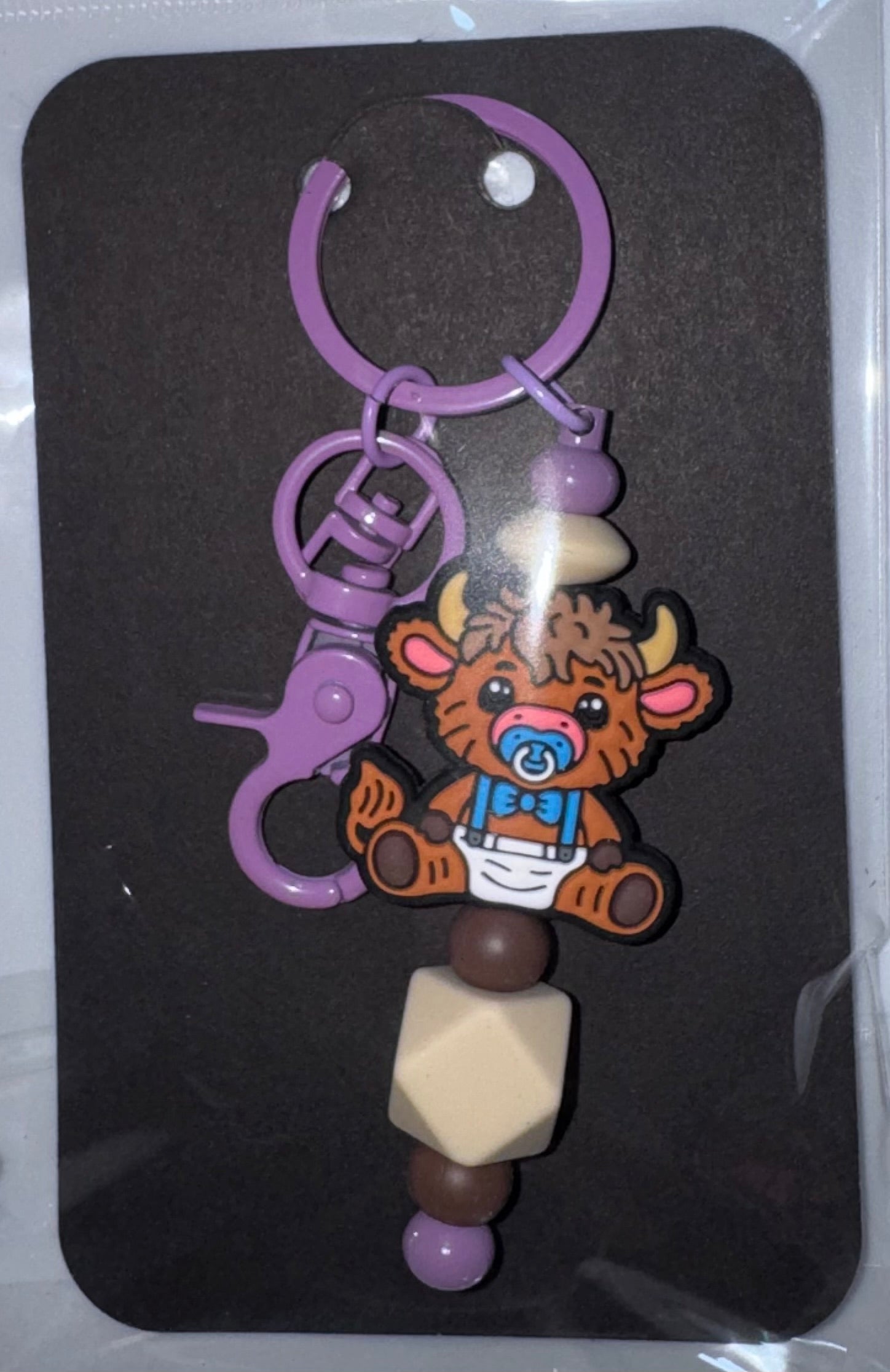 Baby cow beaded keychain