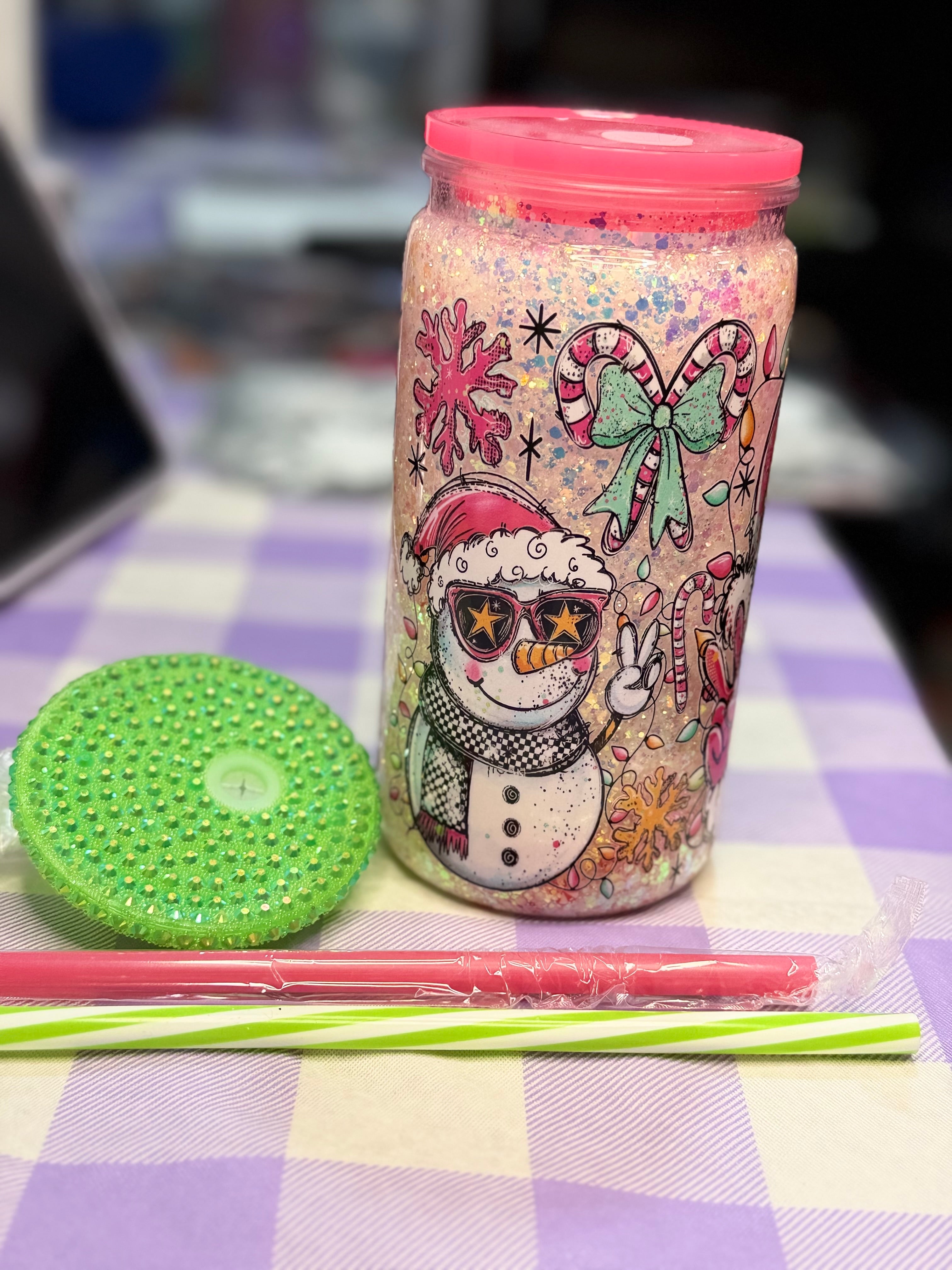 16 oz Santa with Santa straw topper, pink stripe straw and green rhinestone lid