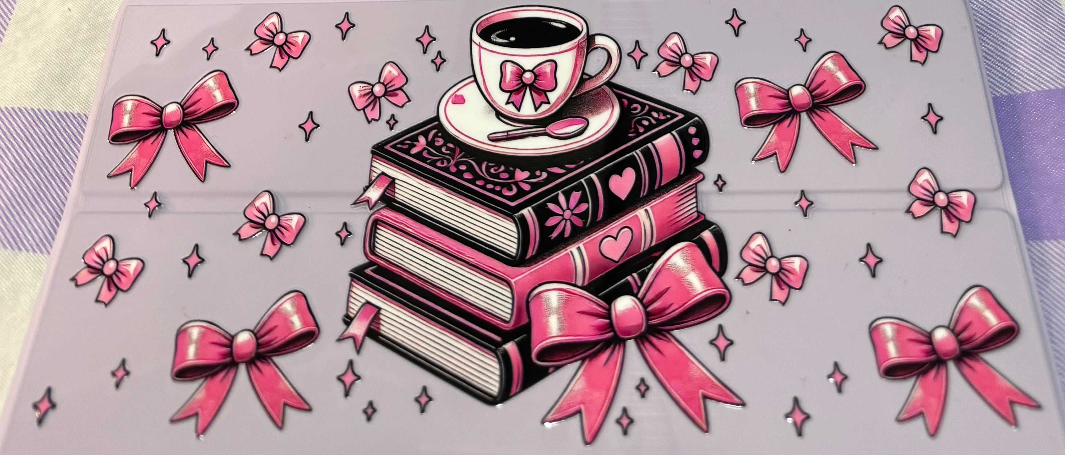 Coffee and books with pink bows wrap