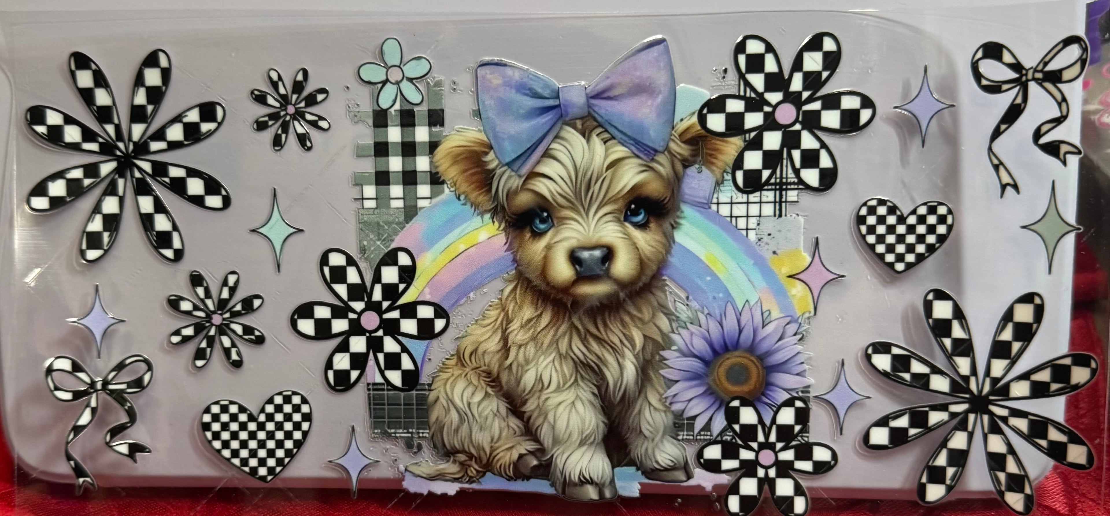 Cow with purple bow and black and white plaid flowers wrap