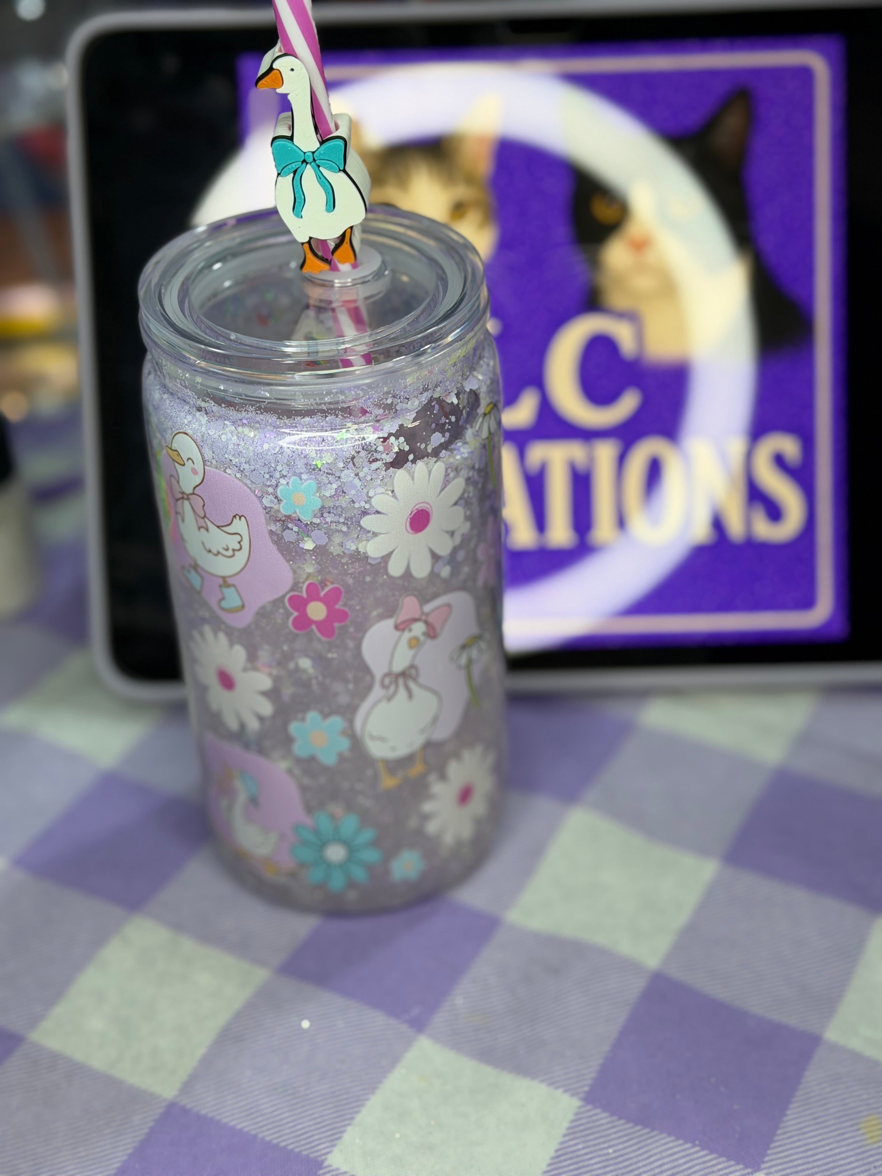 16 oz Geese drip snow globe cup with striped straw and Goose straw topper