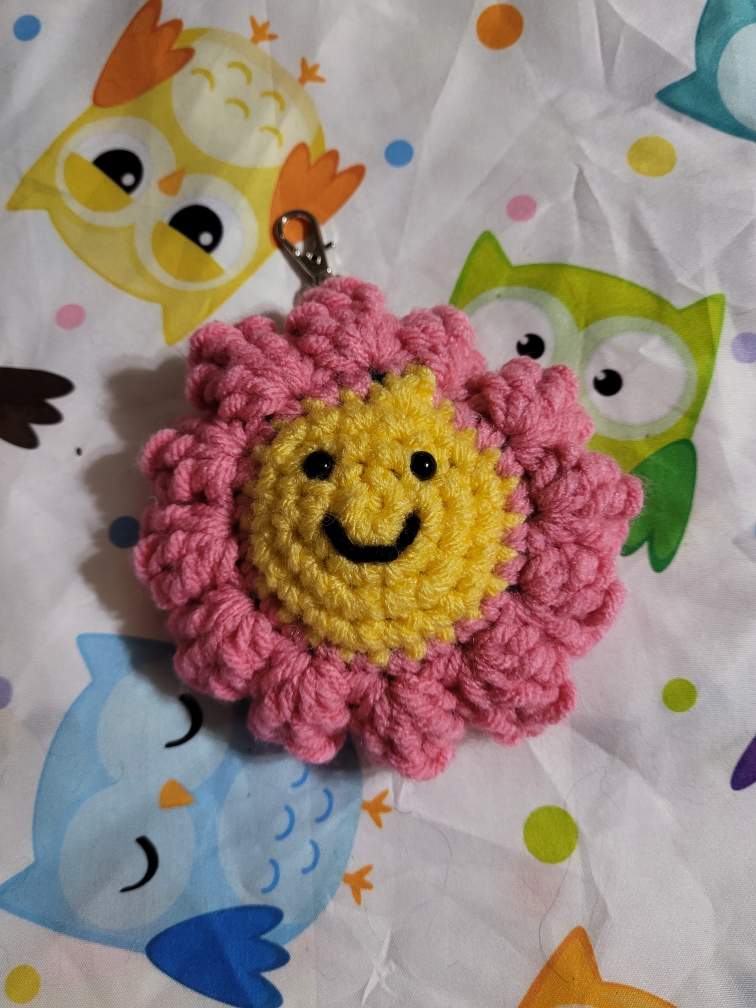 Crocheted Pink and yellow daisy keychain