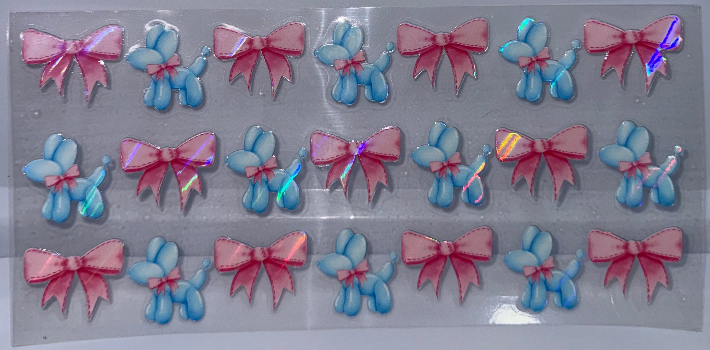 Blue balloon dog and pink bows holographic wrap