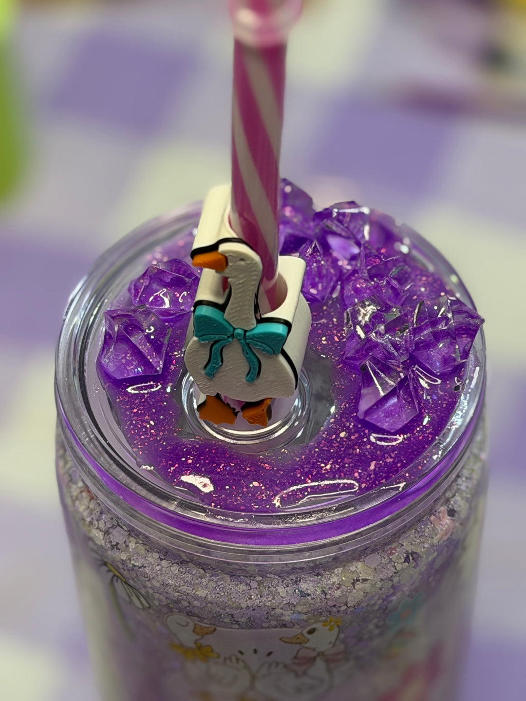 16 oz Geese drip snow globe cup with striped straw and Goose straw topper