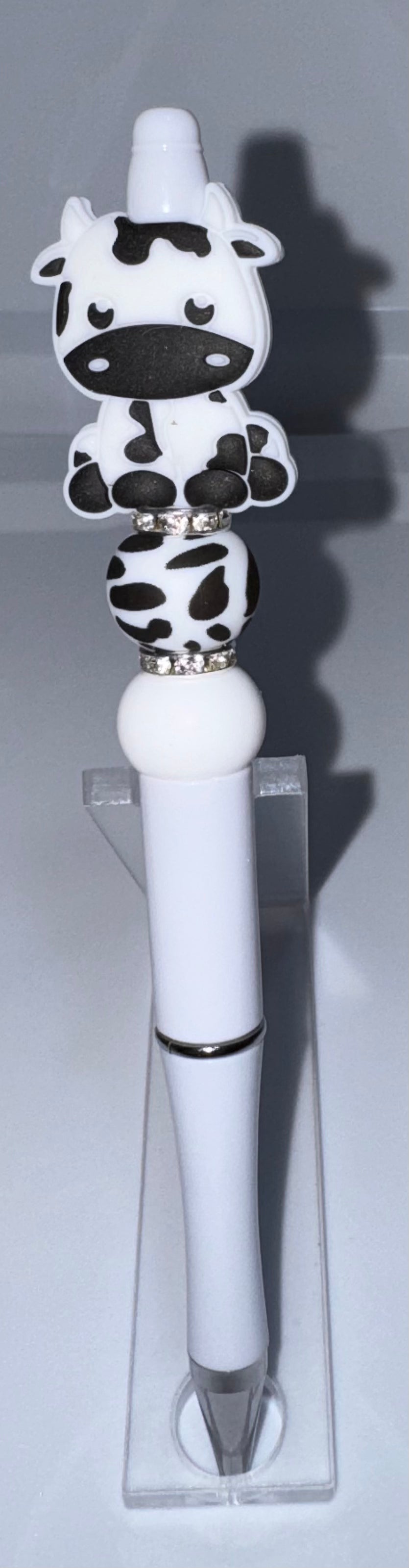 Black and white cow beaded pen