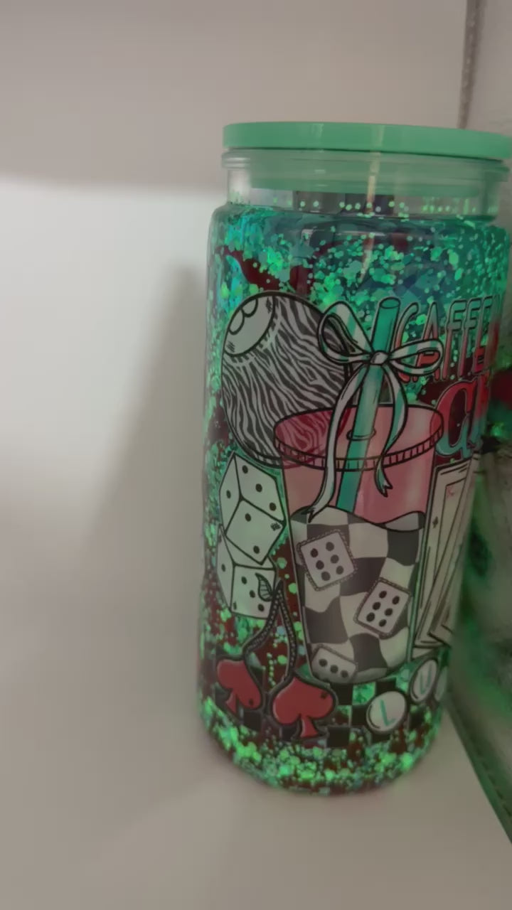 20 oz Caffeine and Chaos snow globe cup with Dice straw topper and checkered straw